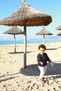 Cute boy playing in sand on beach on Mallorca Royalty Free Stock Photo