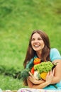 Cute happy woman with organic healthy vegetables Royalty Free Stock Photo