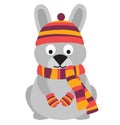 Cute hare sitting on its hind legs. Hare wearing a knitted warm hat, scarf and mittens.