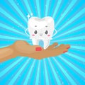 Cute healthy white tooth on hand with dental health care cartoon vector illustration for children dentist cabinet. Royalty Free Stock Photo