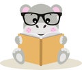 Cute hippo sitting reading a book Royalty Free Stock Photo