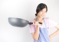 Cute House wife maid is holding Pan ready to cook Royalty Free Stock Photo