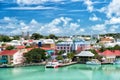 Cute houses with yacht, boat at harbor, St. John, Antigua Royalty Free Stock Photo