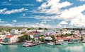 Cute houses with yacht, boat at harbor, St. John, Antigua Royalty Free Stock Photo