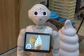 Cute humanoid robot at ice cream shop in Osaka, Japan