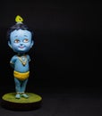 Cute idol of Hindu God Lord Krishna for Janmashtami