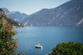 Cute idyllic Italian village and lake captured from the water. Limone at lago di Garda Royalty Free Stock Photo