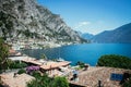 Cute idyllic Italian village and lake captured from the water. Limone at lago di Garda Royalty Free Stock Photo