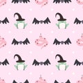 Cute illustrated halloween pattern with a frog, snake and a bat. Seamleass repeated background.