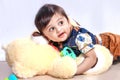 Cute Indian baby child playing with toy Royalty Free Stock Photo