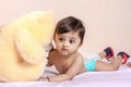 Cute Indian baby child playing with toy Royalty Free Stock Photo
