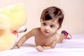 Cute Indian baby child playing with toy Royalty Free Stock Photo