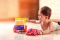 Cute Indian baby child playing with toy Royalty Free Stock Photo