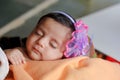 Cute Indian baby girl sleeping on bed Royalty Free Stock Photo