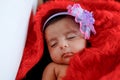 Cute Indian baby girl sleeping on bed Royalty Free Stock Photo