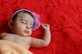 Cute Indian baby girl sleeping on bed Royalty Free Stock Photo