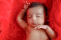 Cute Indian baby girl sleeping on bed Royalty Free Stock Photo