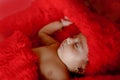 Cute Indian baby girl sleeping on bed Royalty Free Stock Photo