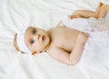 Cute infant lying on the bed at home Royalty Free Stock Photo