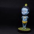 Cute and innocent idol of Hindu God Lord Krishna; right orientation