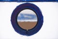 small lookout window over a boatman's boat, navy blue and white mediterranean tones Royalty Free Stock Photo