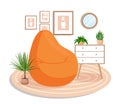 Cute interior with modern furniture and plants. Design of a cozy living room with fluffy seat, beanbag, plants, pictures Royalty Free Stock Photo