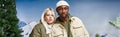 cute interracial couple in warm clothes