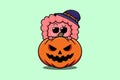 Cute Intestine cartoon hiding in pumpkin halloween Royalty Free Stock Photo