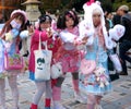 Cute Japanese Lolita Fashion Girls Posing in the Park -- cute girls, fashion girls, lolita girls, cosplay girls Royalty Free Stock Photo