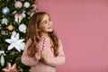 Cute joyful little child girl holding lollipop candy cane Royalty Free Stock Photo