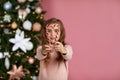 Cute joyful little child girl holding lollipop candy cane Royalty Free Stock Photo