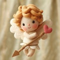 Cute kawaii cartoon style cupid made of felt