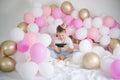 Cute kid boy smiling and taking selfie photo on cellphone  with balloon. Birthday party Royalty Free Stock Photo