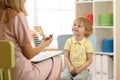 Cute kid boy at speech therapist office Royalty Free Stock Photo