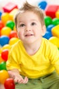 Child playing colorful balls top view Royalty Free Stock Photo