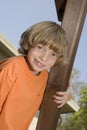 Cute kid climbing a playset