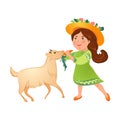 Cute kid girl in green dress with hat give carrot to goat