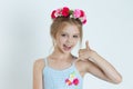 Cute kid girl showing call me fingers hand sign gesture