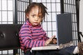 Cute kid with his computer