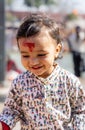 cute kid innocent facial expression with Ram's name written at head at morning from flat angle