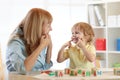 Cute kid little boy at speech therapist office Royalty Free Stock Photo