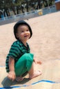 Cute kid playing on the beach Royalty Free Stock Photo