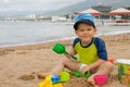 Cute kid playing on the beach Royalty Free Stock Photo