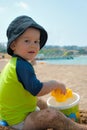 Cute kid playing on the beach Royalty Free Stock Photo