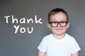 Cute Kid with a Thank You message Royalty Free Stock Photo