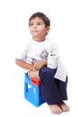 Cute kid with toilet paper on toilet Royalty Free Stock Photo