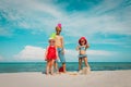 Cute kids -boy and girls- play with toys and sand on beach Royalty Free Stock Photo