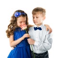 Cute kids, boy gives a flower little girl. Valentine`s and Women Day. Child love Royalty Free Stock Photo