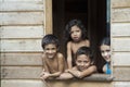 Cute Brazilian kids looking out of window, Gurupa, Amazonia, Brazil