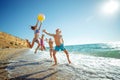 Cute kids having fun on the sandy beach in summer. Royalty Free Stock Photo